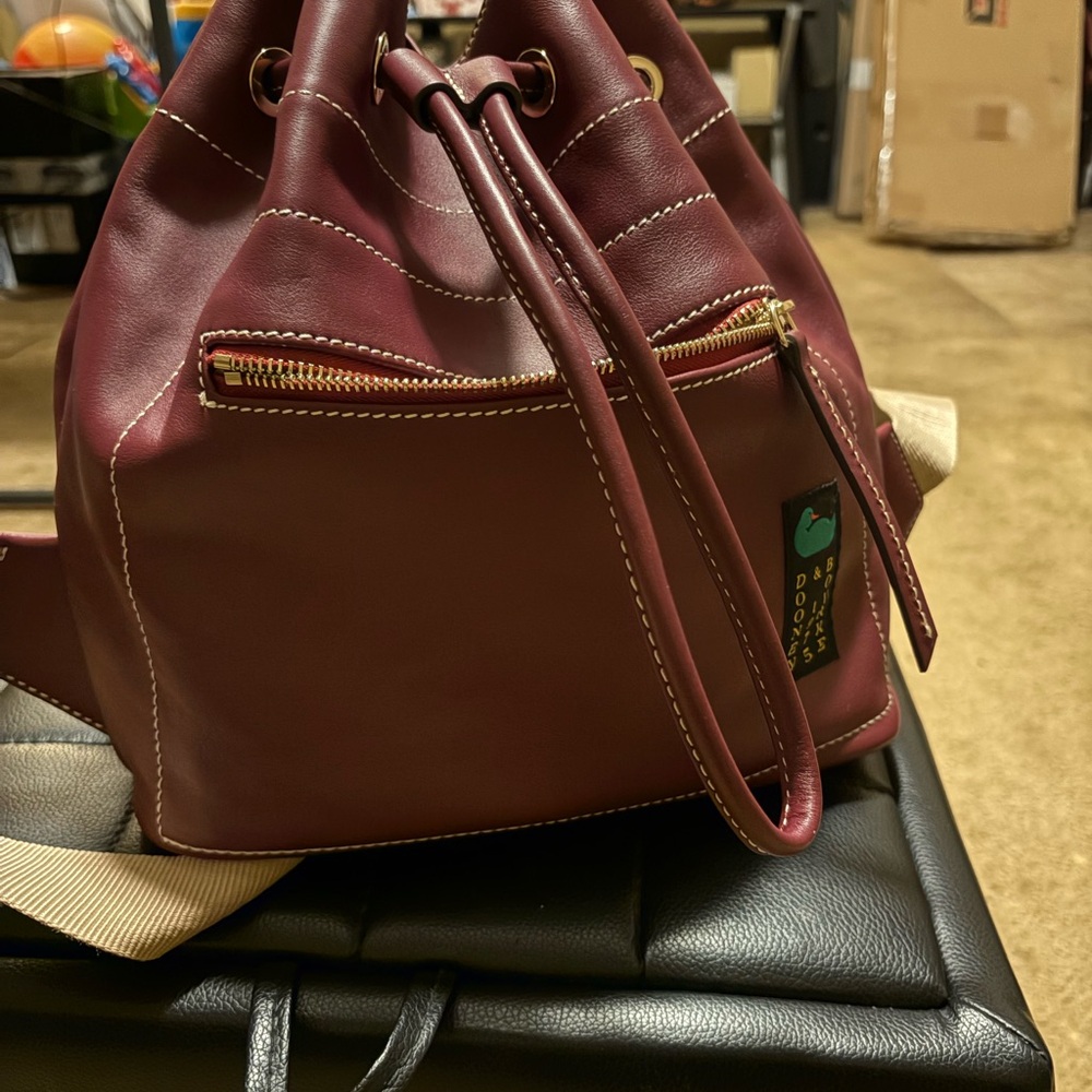 Dooney and Burke Drawstringng Backpack in color Grape. - Picture 8 of 12